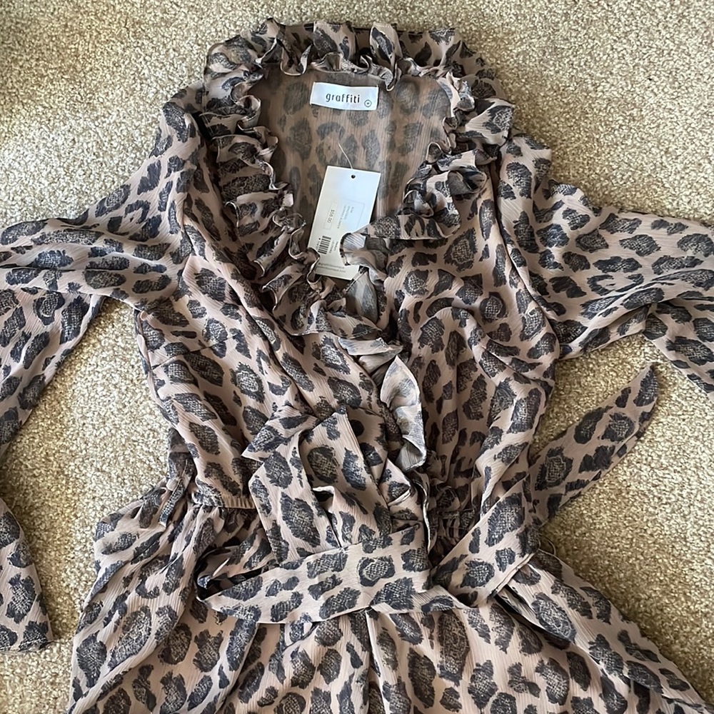 Never worn cheetah romper bell sleeve